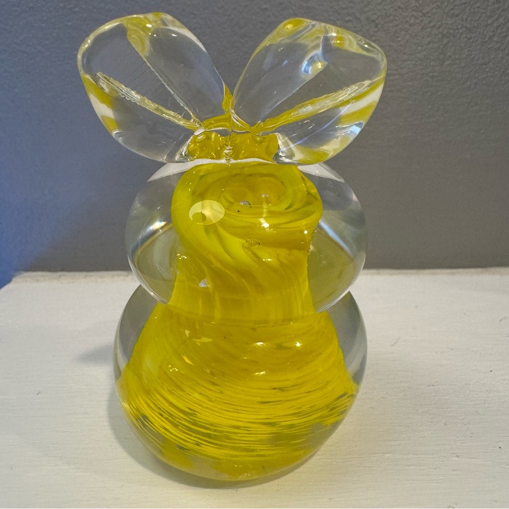 Handblown one of a kind glass bunny rabbit with yellow glass design inside.